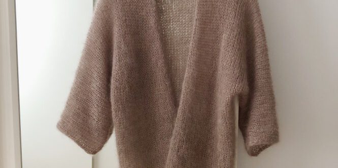 Knitting pattern for an oversize cardigan with wide batwing sleeves.